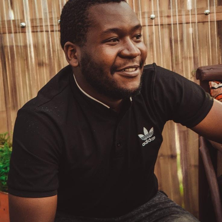 Kaveri Mehta, Lead Design Curator at MosaicHiddenGranite, reviewing corporate floral arrangements